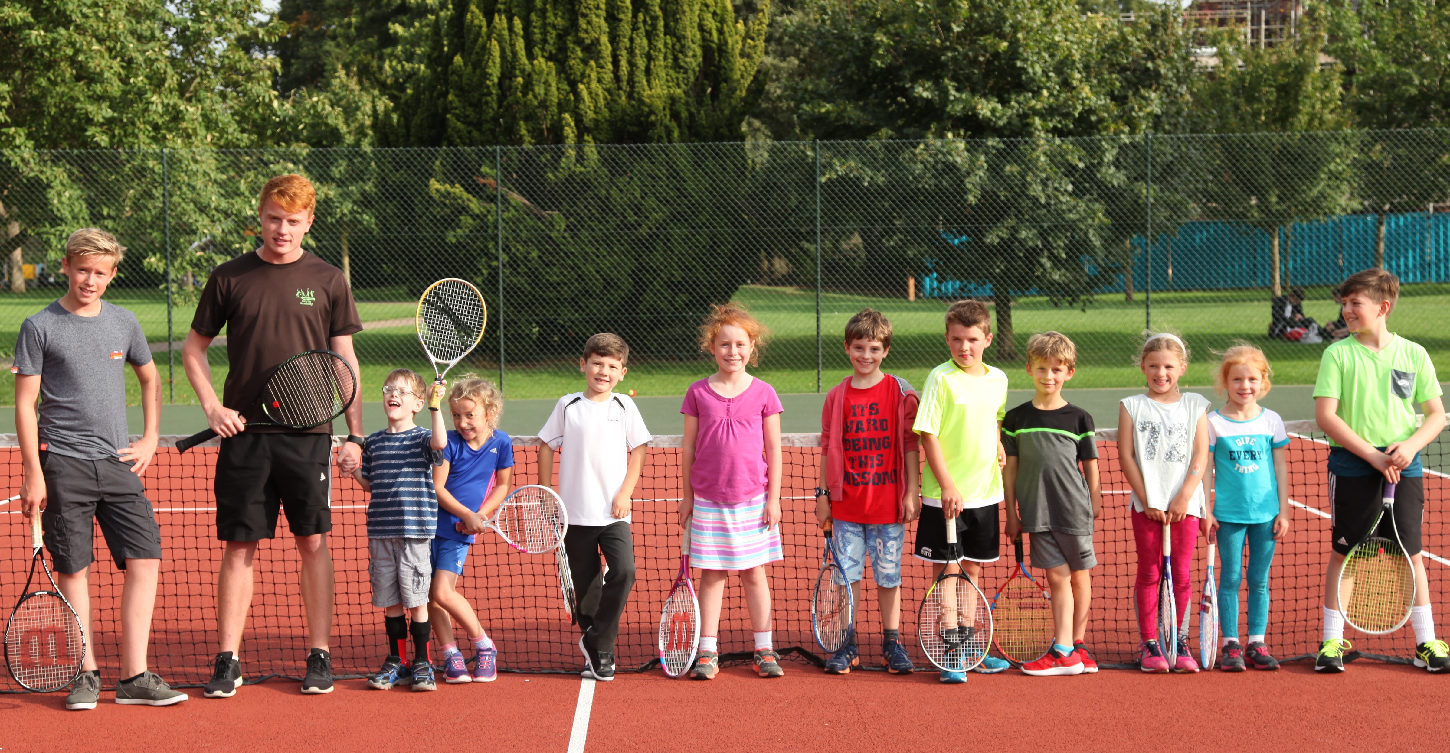 A childrens tennis lesson in Bridgeford Park